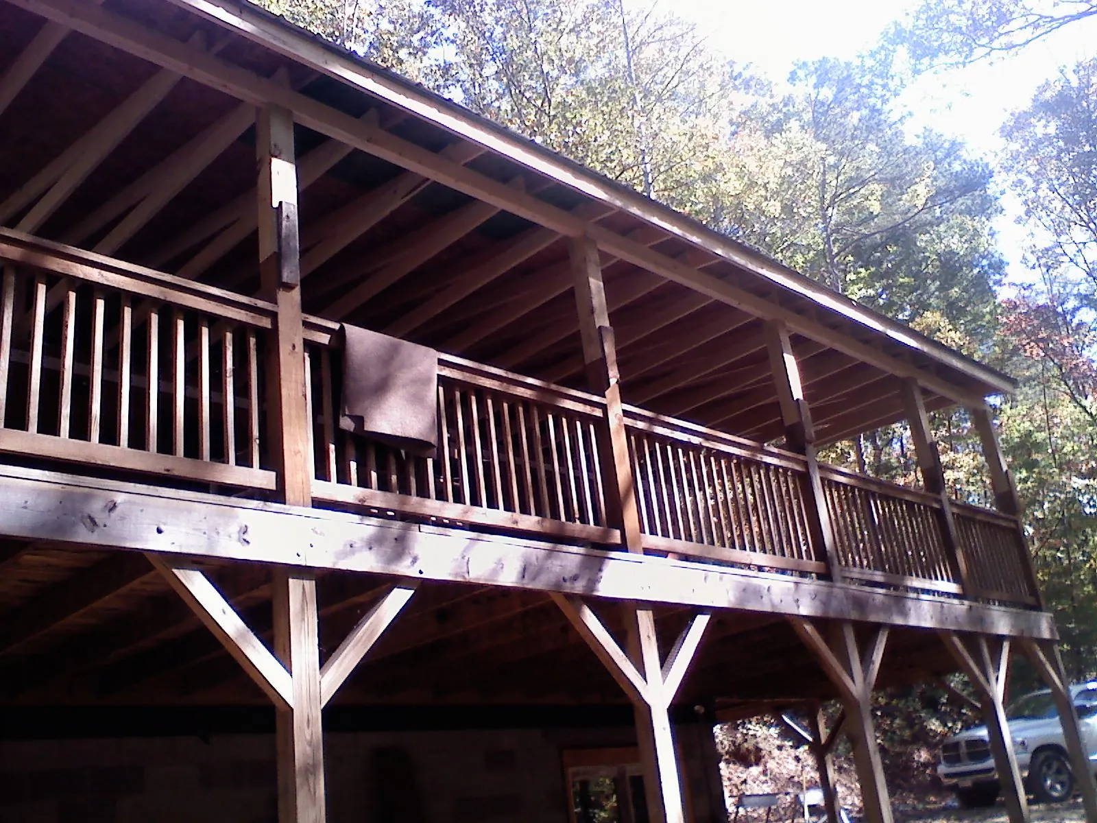 Timber framing under a new elevated porch and deck — Roof Leak Repair in East Granby by Roofing Brothers